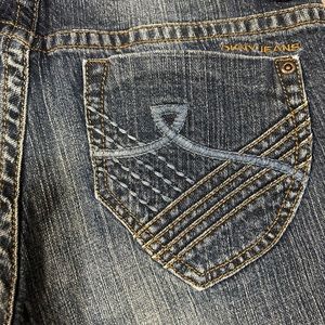 DKNY JEANS.    Size 6. Faded distressed Bootcut dark denim jeans.